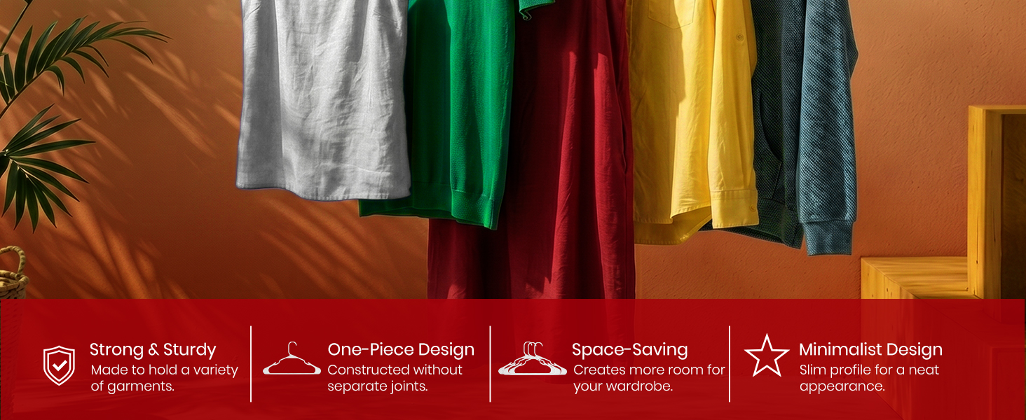 a row of clothes hanging on a black hanger.