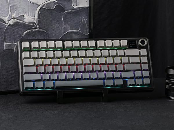 a black and silver keyboard with a black base.