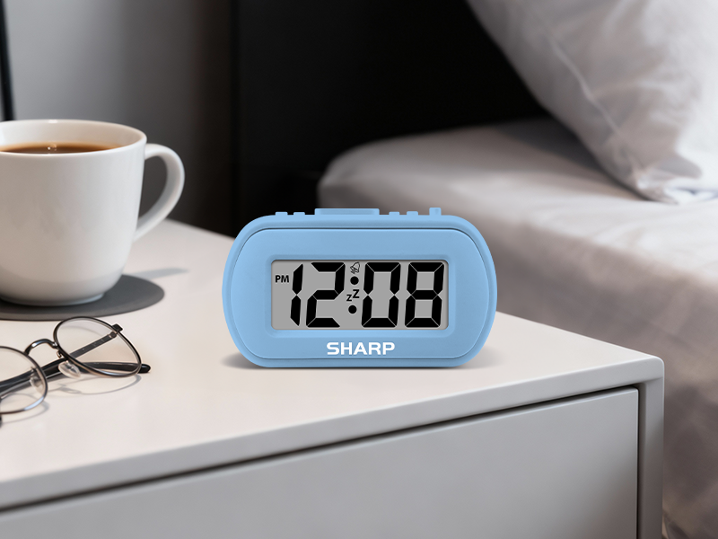 Sharp SPC483 battery powered alarm clock rubberized rubber small compact