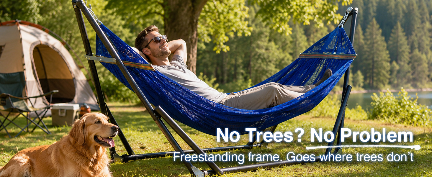 Portable hammock needs no trees, set up at campsite with man relaxing with pet dog