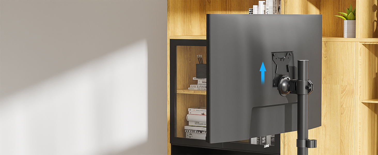 Dark grey wall-mounted security or storage safe with digital interface, installed next to wooden shelving unit.