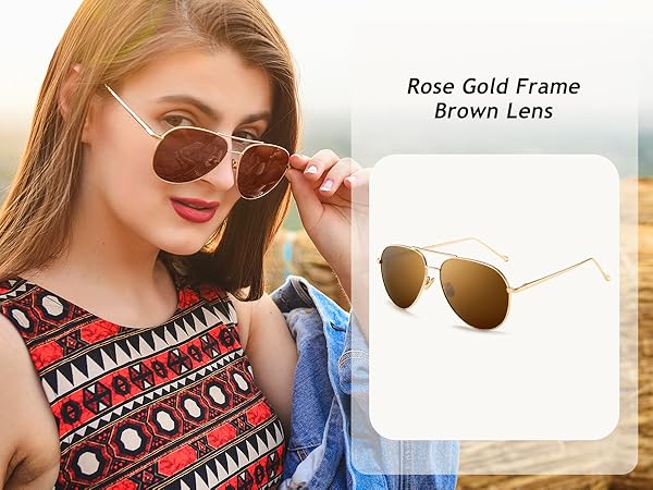 A stylish and elegant lady wearing brown lens aviator sunglasses
