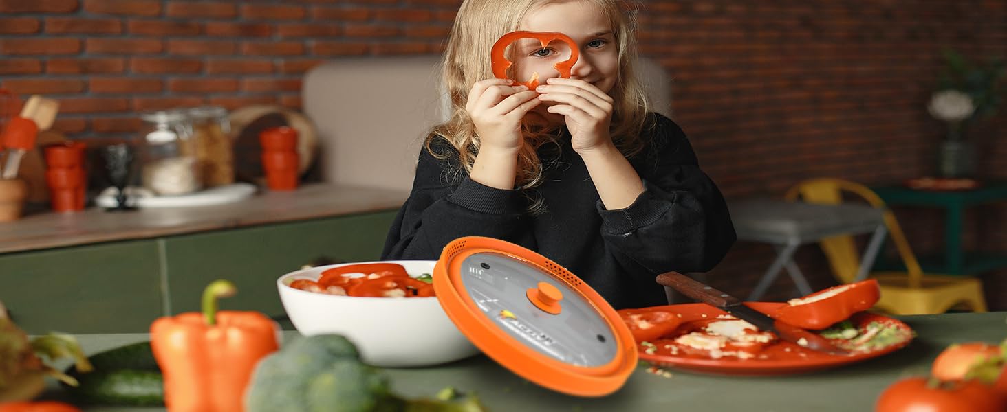 orange splatter cover and a girl holding a tomato