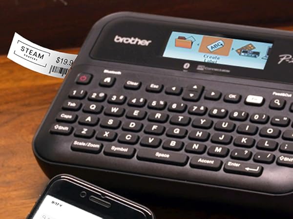 Label maker on desk, printing retail shelf label with brand logo, MSRP, and barcode