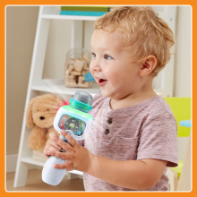 Child singing into microphone