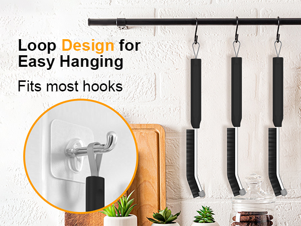 Text reads 'Loop Design for Easy Hanging' and 'Fits most hooks'. Wall-mounted hooks displaying kitchen utensils with black handles against white wall. Orange circular inset shows hook detail.