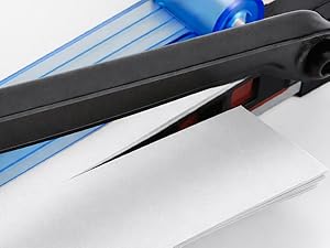 Blade: Close-up of paper cutter blade for clean straight cuts and precise trimming