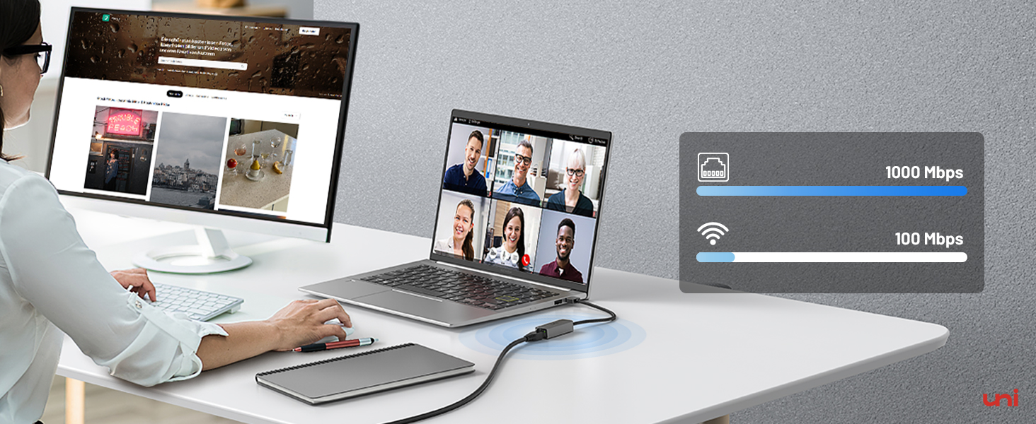 a laptop with a person using a mouse and a mouse