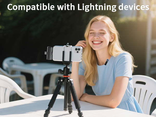 Text reads 'Compatible with Lightning devices'. Outdoor setting with camera mounted on tripod in sunlit environment.