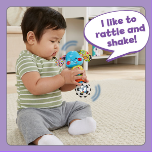 Child shaking the rattle