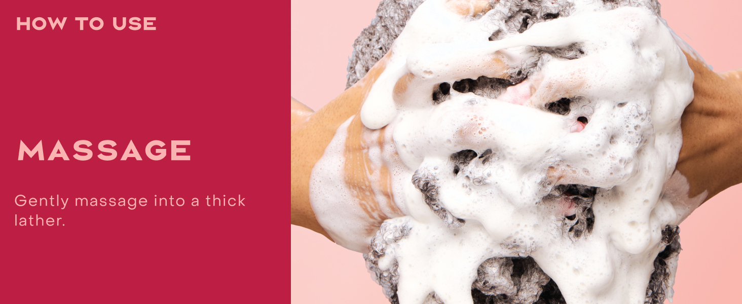 Close up shot of woman&amp;#39;s hands massaging heir covered in foam, next to massaging instructions.