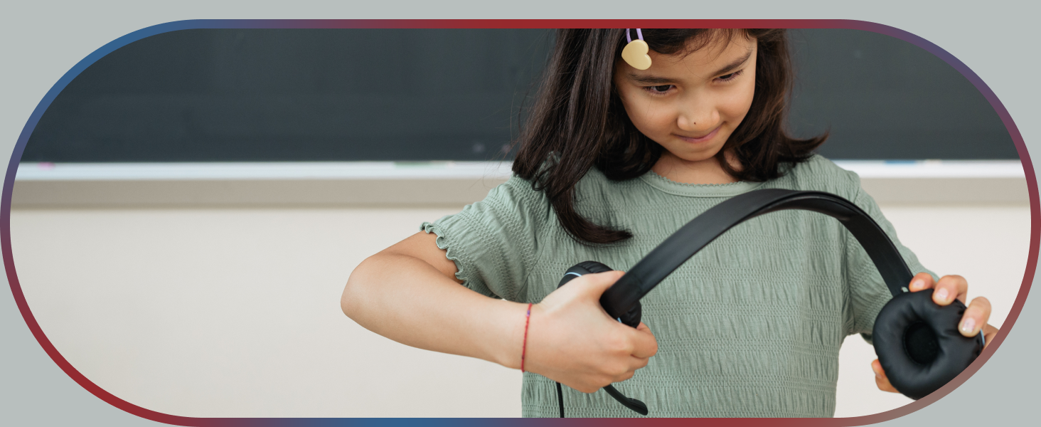 Two children attempting to pull apart a Cyber Acoustics headset