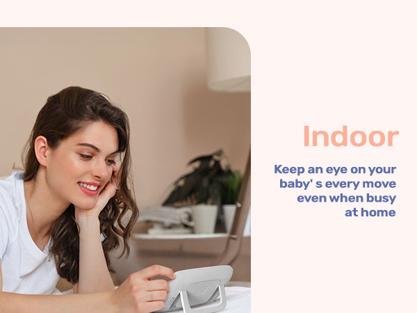 Text reads 'Indoor' and 'Keep an eye on your baby's every move even when busy at home'. Product marketing image showing baby monitor usage.