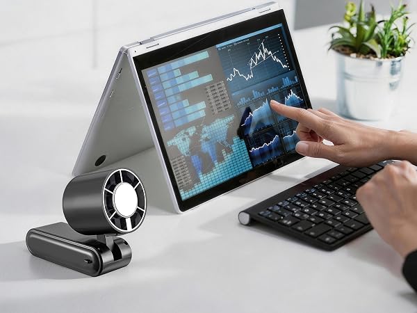Handheld fan supports desktop mode