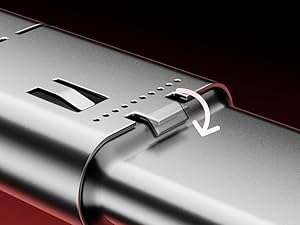 Close-up of a metallic sliding rail mechanism with dotted pattern detailing and curved connection points shown against dark background.