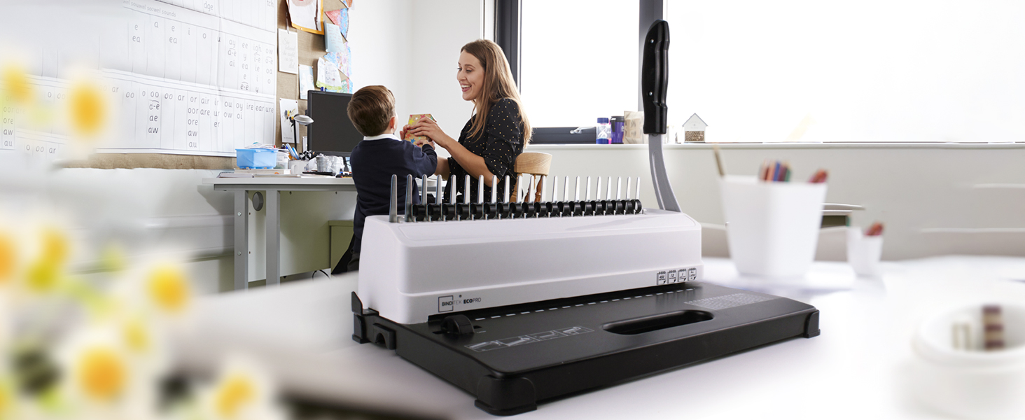 Comb binding machine