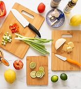 3-piece bamboo cutting board set used for food prep.