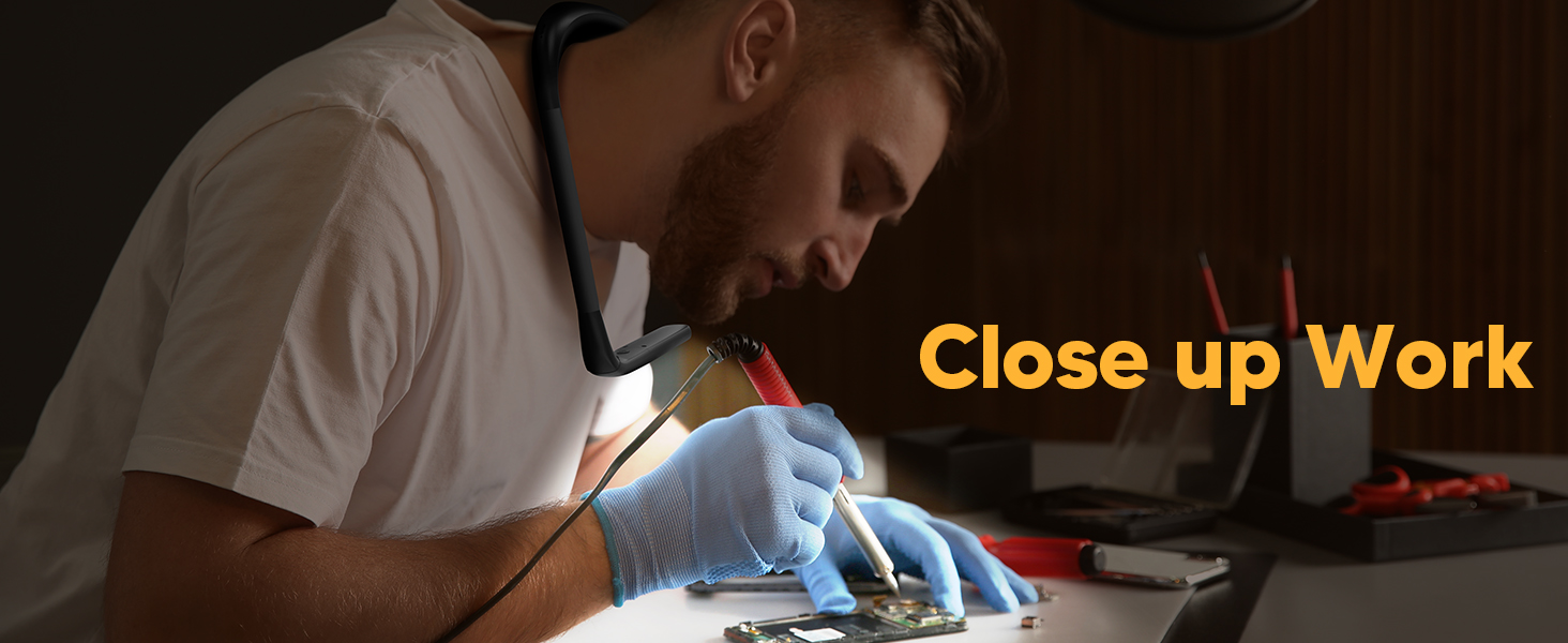 An electrician or mechanic is repairing and using the EastPin necklight for handsfree illumination