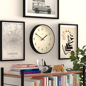 a wall with a clock on it and a bookshelf.