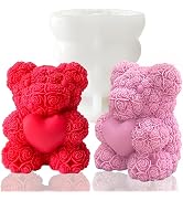 Collection of heart-shaped decorative items in various shades of pink and red, appearing to have a plush or fuzzy texture.