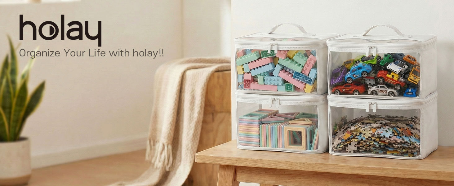Clear toy storage bags holding blocks, toy cars, puzzles,on a wooden table