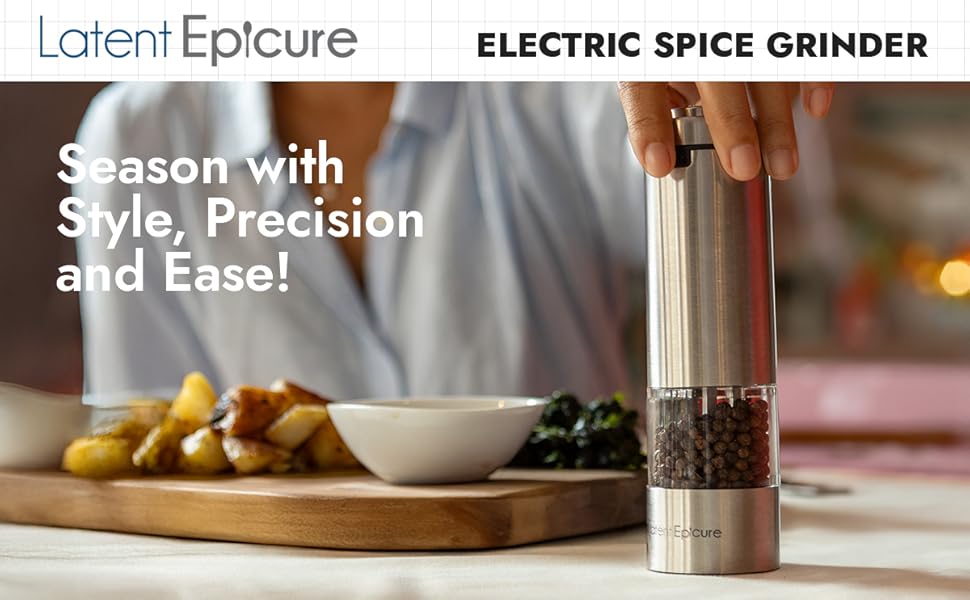 Latent Epicure grinder used at dining table beside roast potatoes, dip bowl &amp; warm ambient lighting