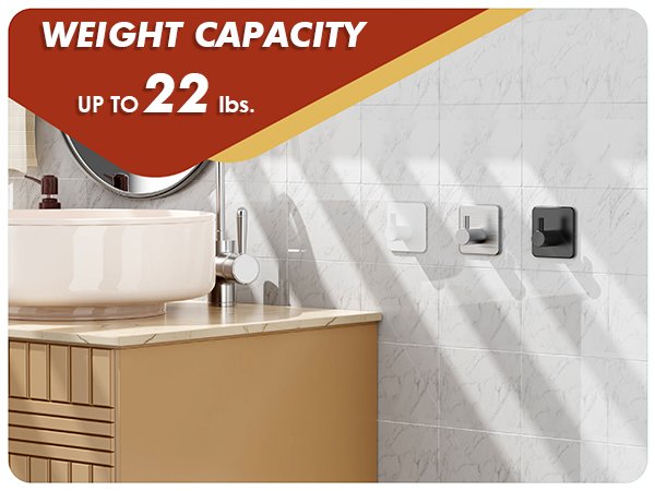 Heavy-duty adhesive hooks hold up to 22 lbs, available in black, silver, and white