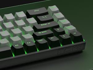 Close-up sequence of mechanical keyboard keys with green LED backlighting showing different angles and lighting effects against dark background.