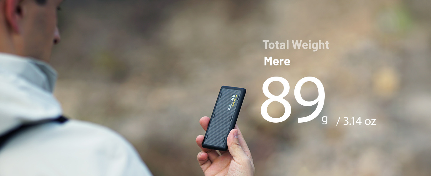 A person holding the NB Air in their hand, the camera is over this persons shoulders.