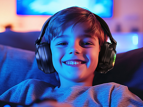 a boy wearing a pair of wireless headphones