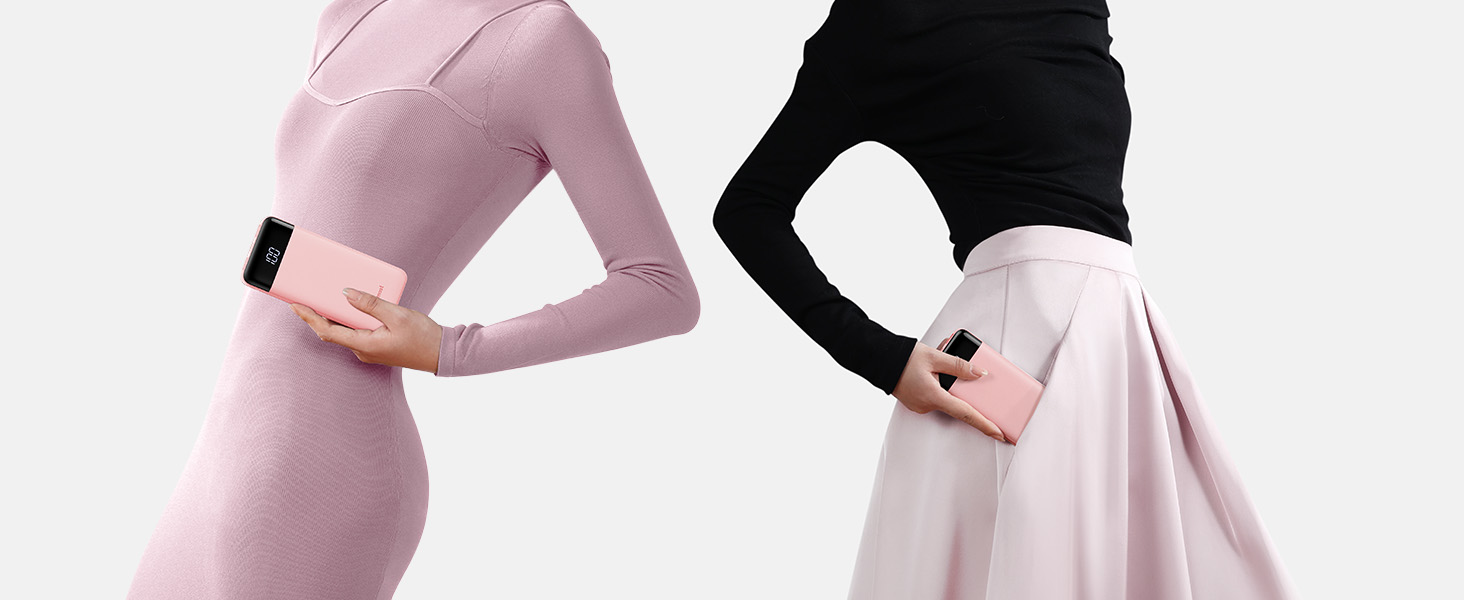 Two long-sleeved athletic tops shown side by side - one in soft pink and one in black, displaying sleeve detail.