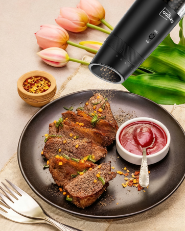 The grinder is being used to add fresh pepper to a dish