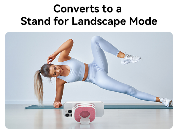 Text reads 'Converts to a Stand for Landscape Mode'. Shows pink device stand being used during a plank exercise position on exercise mat against light background.