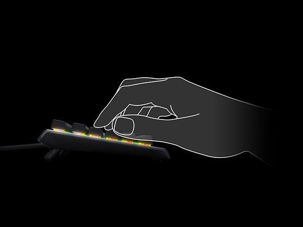 A side profile of a graphic hand typing on Apex 3 TKL