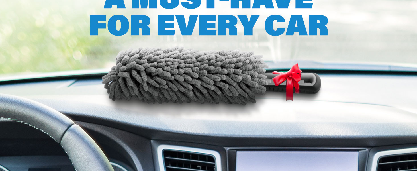 Compact gray dash duster placed on car dashboard, perfect for daily interior cleaning