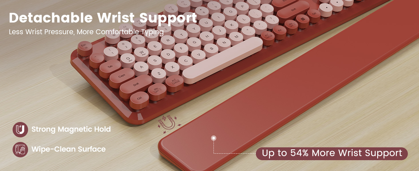 Keyboard on desk with detachable magnetic wrist rest, showing strong hold and wipe-clean surface.