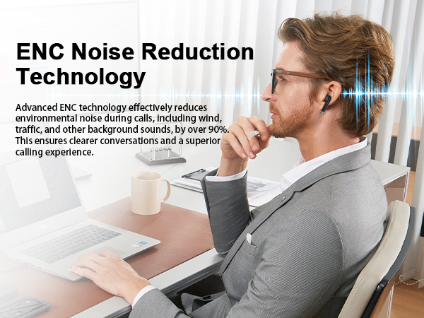 a man sitting at a desk with a laptop and a laptop.