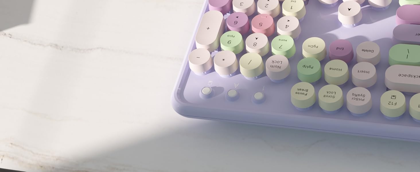 purple colorful wireless keyboard and mouse