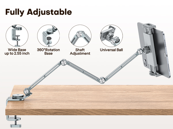 Text reads 'Fully Adjustable' and 'Wide Application'. Product demonstration showing adjustable tablet/phone mount with multiple articulation points and mounting options, displayed on wooden surface.