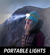 A women stands outside wearing an Energizer head lamp