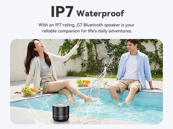 Text reads 'IP7 Waterproof' and 'With an IP7 rating of Bluetooth speaker is your reliable companion for life's daily adventures.' Two people sitting poolside with black cylindrical Bluetooth speaker in water, demonstrating waterproof capability.