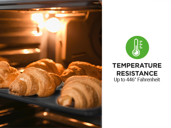 croissants on oven pan inside hot oven showcasing temperature resistance of sheet pans for baking