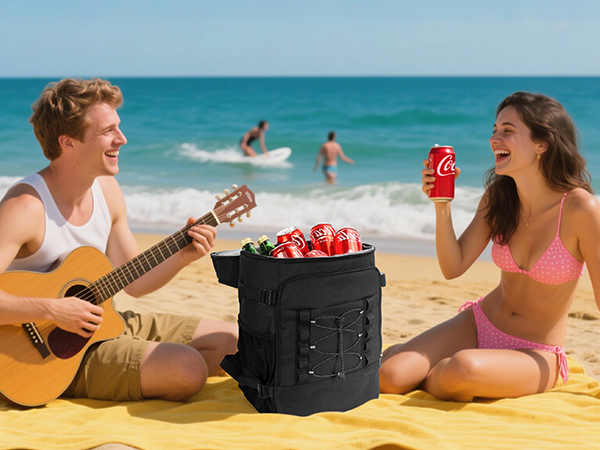A couple drinking iced drinks on the beach with cooler backpacks