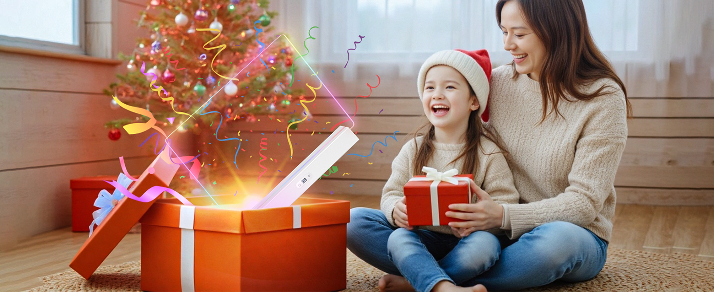 Illuminated Christmas tree with colorful decorations next to large red gift boxes. Open gift box emits bright light. Carpeted floor in a cozy room setting.