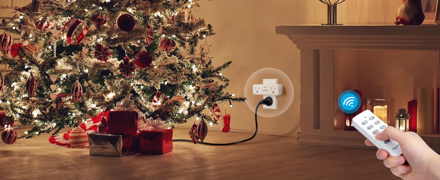 a hand using remote control light switch for holiday Christmas decoration