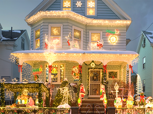 christmas decorating string light outside hanging fairy lights