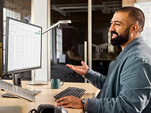 a man using mk370 combo for business wireless keyboard and mouse