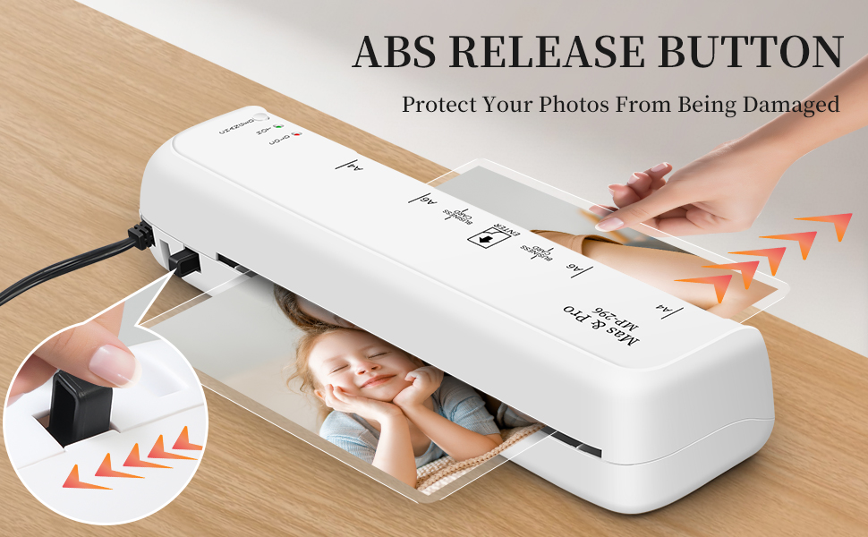 Close-up of the MAS &amp;amp; PRO laminator ABS release button used for clearing jammed pouches