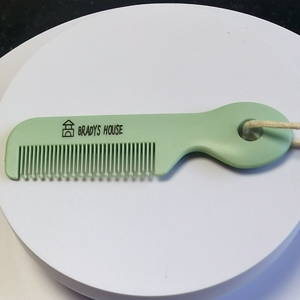 Baby comb with rounded teeth
