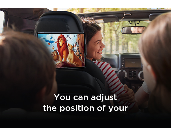 a car with a woman sitting in the back seat and a woman sitting in the back seat.